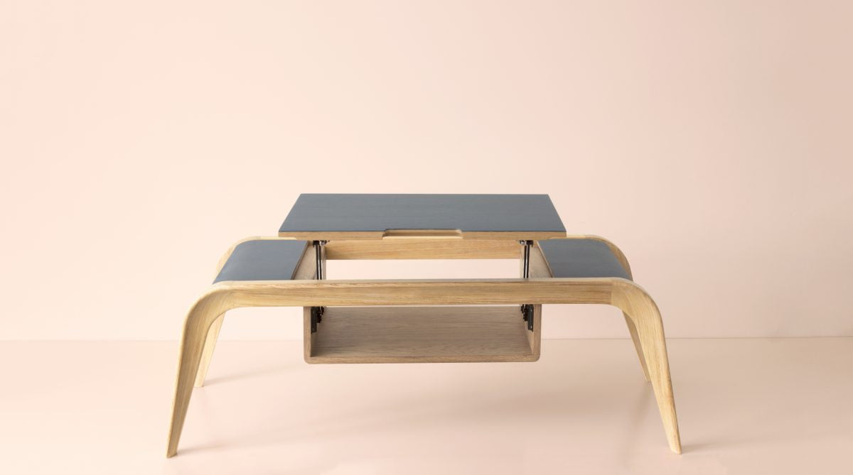 View of extendable mechanism on luxury oak coffee table showing open storage underneath